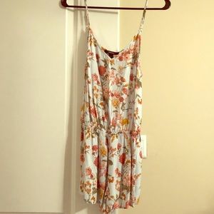 Floral print romper. Never worn.